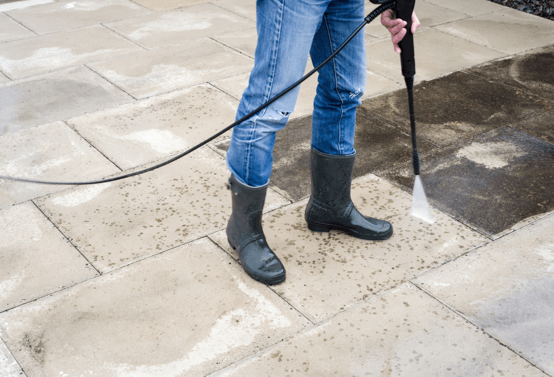 A man cleaning their patio to show how they could buy products from a company that considered various factors before selling them.